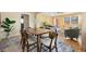 Open concept dining and living rooms feature hardwood floors and lots of natural light at 1601 Albion St, Denver, CO 80220