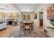 Open concept dining room connects to living room and kitchen at 1601 Albion St, Denver, CO 80220