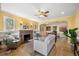 Bright living room with hardwood floors, fireplace, and open layout, perfect for entertaining and everyday living at 1601 Albion St, Denver, CO 80220