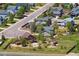Aerial view of a residential neighborhood with a fenced-in backyard with playset and firepit at 4804 Eckert St, Castle Rock, CO 80104