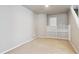 A roomy basement with beige carpeting and white built-in shelves for extra storage at 4804 Eckert St, Castle Rock, CO 80104