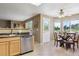 Well-lit kitchen with a breakfast nook and views of the backyard at 4804 Eckert St, Castle Rock, CO 80104