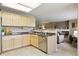 Bright kitchen with light wood cabinets and stainless steel appliances at 4804 Eckert St, Castle Rock, CO 80104