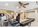 Basement featuring recording studio with sound equipment, carpet flooring, neutral walls, and a ceiling fan at 5704 W Atlantic Pl, Lakewood, CO 80227