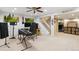 Spacious basement with staircase, home theater system, and entertainment area is ideal for entertaining or relaxing at 5704 W Atlantic Pl, Lakewood, CO 80227
