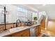 Kitchen offers open layout, modern sink, dishwasher, and stainless steel appliances at 5704 W Atlantic Pl, Lakewood, CO 80227