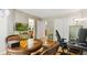 Office with a light, neutral walls, work space, a checkerboard table and a view at 5704 W Atlantic Pl, Lakewood, CO 80227