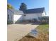 Charming single-story home with a well-maintained front yard and a concrete driveway at 254 Donna St, Fort Lupton, CO 80621