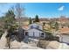 Stunning aerial view of the property showcasing its location, garage, and landscaping at 7761 Everett Way, Arvada, CO 80005