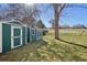 Two storage sheds with painted siding provide practical storage for your tools and equipment at 7761 Everett Way, Arvada, CO 80005