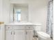 Bathroom with white vanity, toilet and shower/tub combo at 6837 S Webster St # C, Littleton, CO 80128