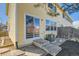 Backyard view featuring the exterior of the home and patio area at 400 Smith Cir, Erie, CO 80516