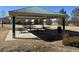 Community picnic area with shaded pavilion and picnic tables for gatherings and relaxation at 400 Smith Cir, Erie, CO 80516