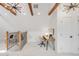 Bonus room/loft features wood beams, bright lighting and skylight at 230 E Ellsworth Ave, Denver, CO 80209