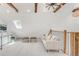 Finished bonus room features skylight, wood beams and plenty of room to relax at 230 E Ellsworth Ave, Denver, CO 80209