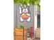 Building exterior with a mural of a dog eating ramen, adding a playful touch at 230 E Ellsworth Ave, Denver, CO 80209