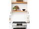This kitchen features light wood shelving and a stainless steel gas range oven at 230 E Ellsworth Ave, Denver, CO 80209