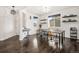 Spacious entryway with dark hardwood floors and access to the dining area at 5904 Clover Ridge Cir, Castle Rock, CO 80104