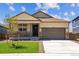 Charming single-Gathering home featuring a covered front porch and a two-car garage at 4864 Longs Peak St, Brighton, CO 80601
