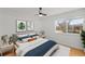 Cozy bedroom with ample natural light, hardwood floors, and stylish decor, perfect for relaxation at 5102 Williams Fork Trl # 201, Boulder, CO 80301