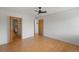 An airy bedroom with hardwood floors connects to a bathroom and features a closet for seamless living at 5102 Williams Fork Trl # 201, Boulder, CO 80301