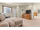 Finished basement area with comfortable seating at 13640 County Road 182, Bennett, CO 80102