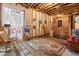 Unfinished basement area with wooden sauna at 13640 County Road 182, Bennett, CO 80102