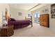 Basement bedroom with a double bed and exterior door at 13640 County Road 182, Bennett, CO 80102