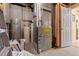 Utility area with water tanks and softener system at 13640 County Road 182, Bennett, CO 80102