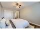 Neutral bedroom featuring a ceiling fan and carpeted floor at 937 N Clarkson St # 405, Denver, CO 80218
