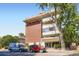 Front view of a brick condo building at 937 N Clarkson St # 405, Denver, CO 80218
