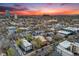 This aerial view shows the neighborhood and the skyline at 20 S Logan St # 104, Denver, CO 80209