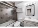 Modern bathroom featuring tiled shower and updated vanity at 20 S Logan St # 104, Denver, CO 80209