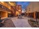 Serene courtyard featuring a charming fountain, paved walkway, and communal outdoor space at 20 S Logan St # 104, Denver, CO 80209