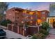 Beautiful multi-Gathering building featuring a gated entrance and well-maintained landscaping at 20 S Logan St # 104, Denver, CO 80209
