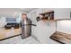 Bright kitchen boasts stainless steel appliances, white subway tile, and wood countertops at 20 S Logan St # 104, Denver, CO 80209