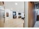 Spacious living room with hardwood floors and natural light at 20 S Logan St # 104, Denver, CO 80209