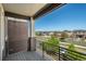 Relaxing balcony view of a charming neighborhood on a sunny day at 630 E Hinsdale Ave, Littleton, CO 80122