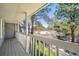View from balcony looking out onto lush green neighborhood at 6810 E Appleton Ct, Centennial, CO 80112