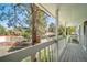 View from balcony looking out onto lush green neighborhood at 6810 E Appleton Ct, Centennial, CO 80112