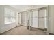 Spacious bedroom closet with mirrored doors and built-in shelving, offering ample storage at 6810 E Appleton Ct, Centennial, CO 80112