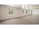 Bedroom with light gray carpet, white walls, and mirrored closet at 6810 E Appleton Ct, Centennial, CO 80112