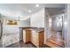 Charming kitchen with wood cabinets, stone counters, and an open layout perfect for entertaining at 6810 E Appleton Ct, Centennial, CO 80112
