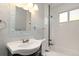 Clean bathroom, featuring a white vanity and a shower/tub combo at 17769 E Purdue Pl, Aurora, CO 80013