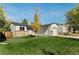 House exterior showcasing a neat lawn and a garage at 17769 E Purdue Pl, Aurora, CO 80013