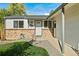 Inviting front entrance with brick facade and landscaping at 17769 E Purdue Pl, Aurora, CO 80013