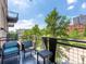 Private balcony with seating, offering a peaceful outdoor space and city views at 1301 Wazee St # 2D, Denver, CO 80204