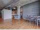 Open concept living room with hardwood floors and exposed concrete at 1301 Wazee St # 2D, Denver, CO 80204