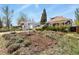 Inviting property featuring lush landscaping and mature foliage at 3941 S Elati St, Englewood, CO 80110