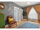 Welcoming living room featuring hardwood floors, decorative rug and warm accents at 3941 S Elati St, Englewood, CO 80110